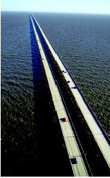An aerial view shows the parallel roadways of the Lake Ponchartrain Causeway in New Orleans, Louisiana. It is the world's longest road bridge.