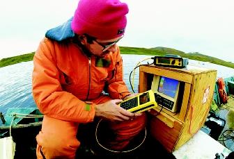 Hydrologists study the physical, chemical, and biological properties of fresh water. This hydrologist tests Alaska's Toolik Lake for contamination.